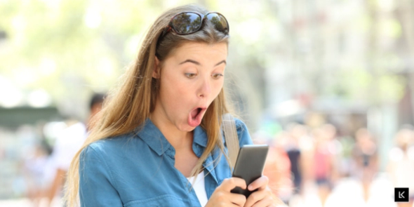 Graduate laughing at the relatable ups and downs of job hunting