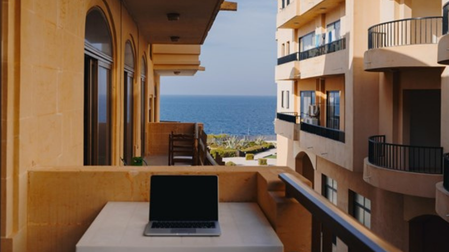 Remote worker travelling long-term while working online