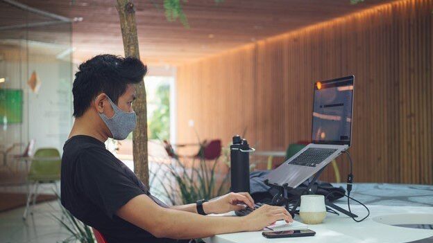Employee enjoying the benefits of working remotely