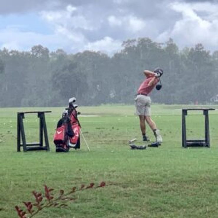 #1inaMillion Golfer Hagan Smith hitting golf balls on the driving range