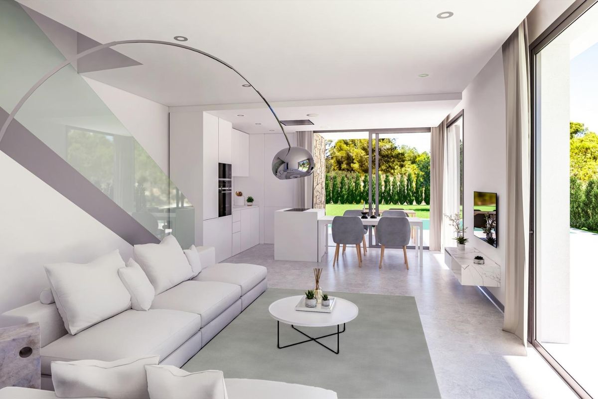 Moderne woonkamer in de 3-slaapkamer villa in Finestrat, Costa Blanca, met een gezellige inrichting en keukenruimte.