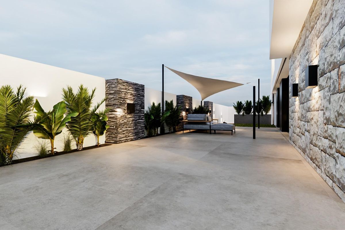 Ruime terrassen gebied met comfortabele zitplaatsen, ideaal voor ontspanning in een 4-slaapkamer villa in Orihuela Costa.