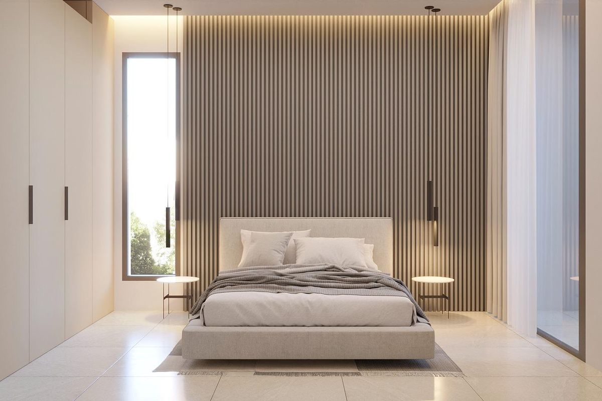 Gezellige slaapkamer met moderne decoratie en grote ramen in een 3-slaapkamer penthouse in La Nucia, Spanje.