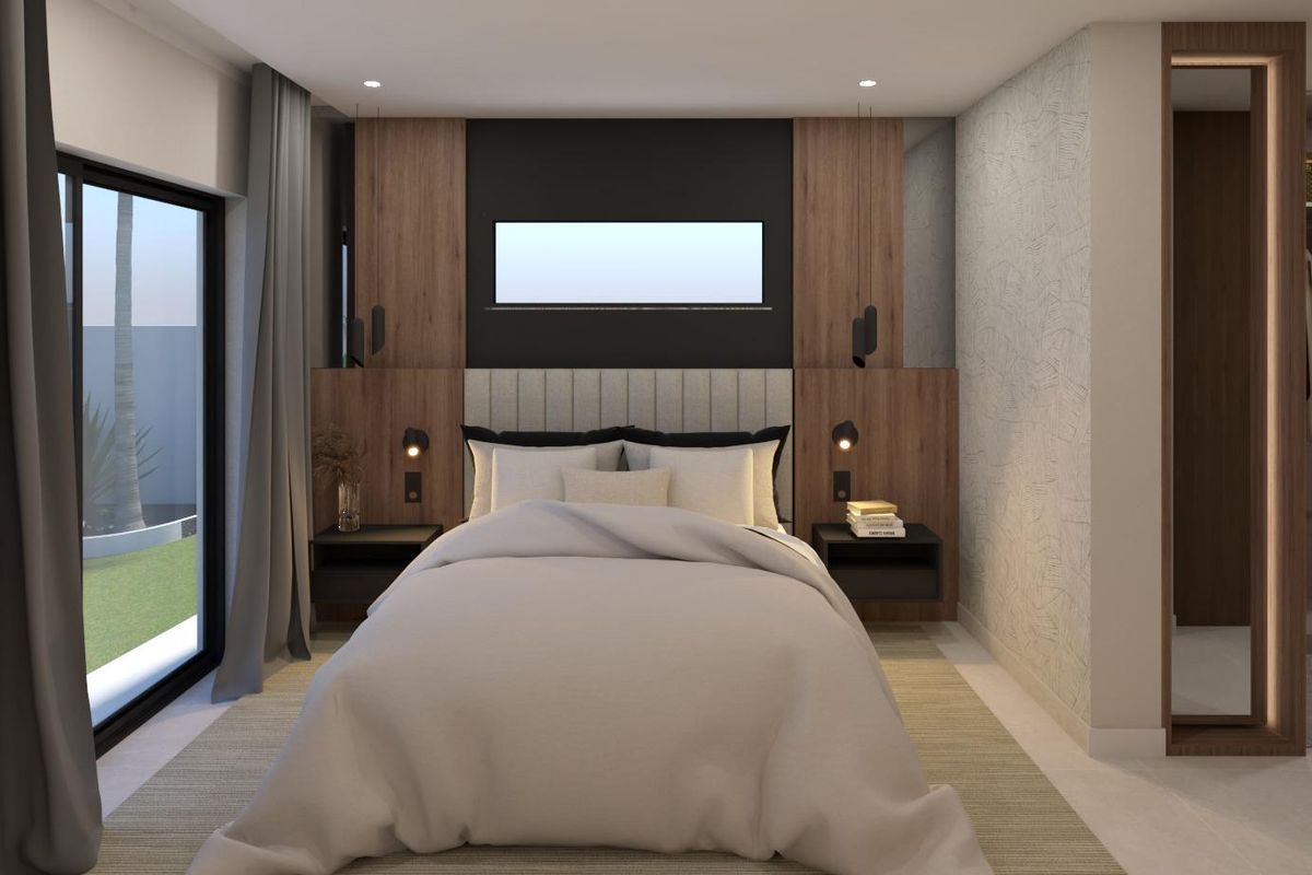 Spacious main bedroom in a 3-bed villa in Pinoso, with modern decor and large windows.