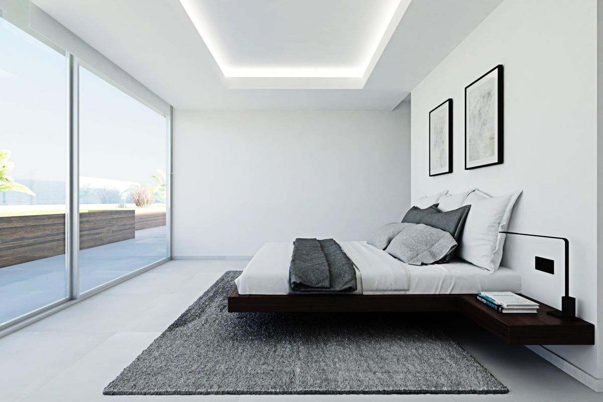 Heldere gasten slaapkamer met toegang tot het terras in een penthouse met 4 slaapkamers, gelegen in Calpe, Costa Blanca Noord.