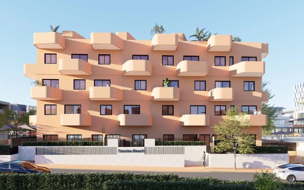 Exterior view of a modern apartment building with balconies in El Campello, Costa Blanca North. New 2-bed apartment with striking facade.