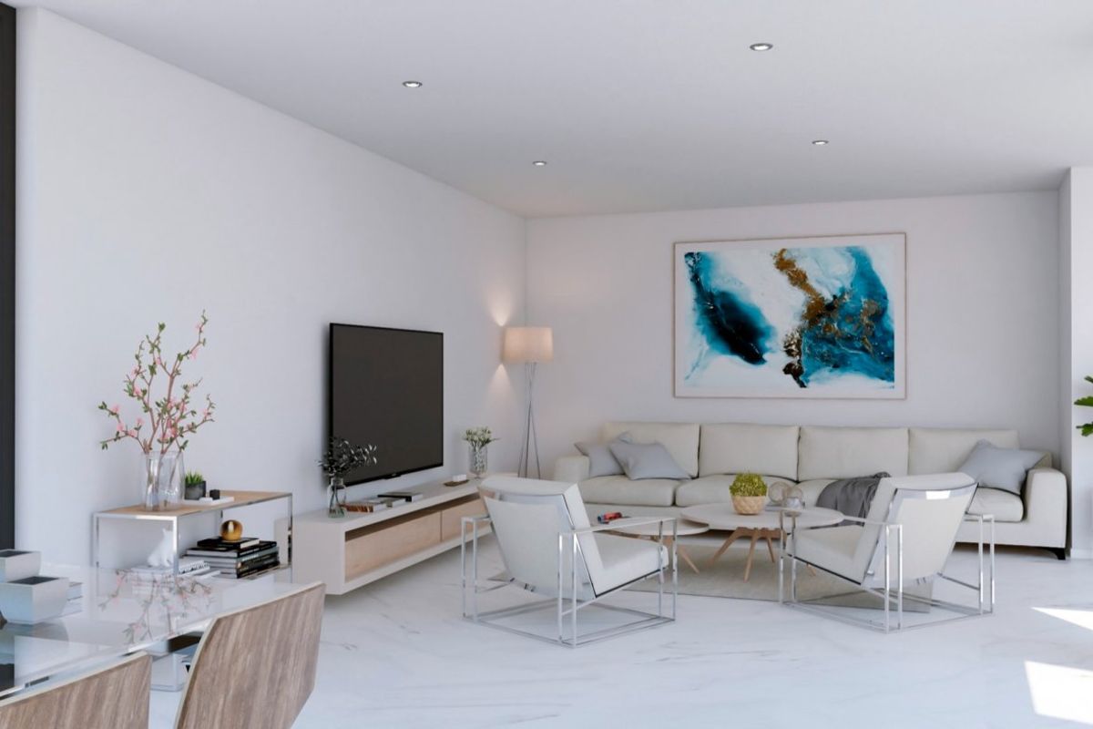 Bright living room of a 4-bed villa in Baños y Mendigo, featuring modern furnishings and large windows.