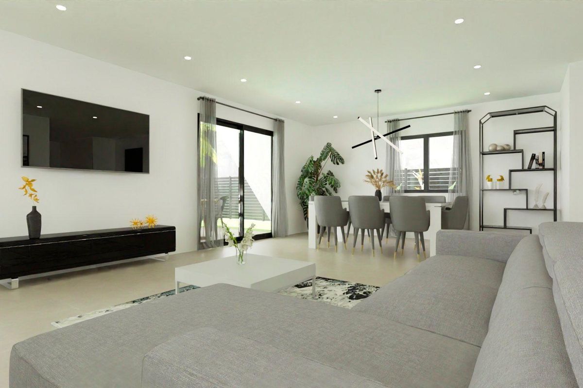 Bright living area of a 3-bed villa featuring modern decor and large windows in Monforte del Cid, Costa Blanca.