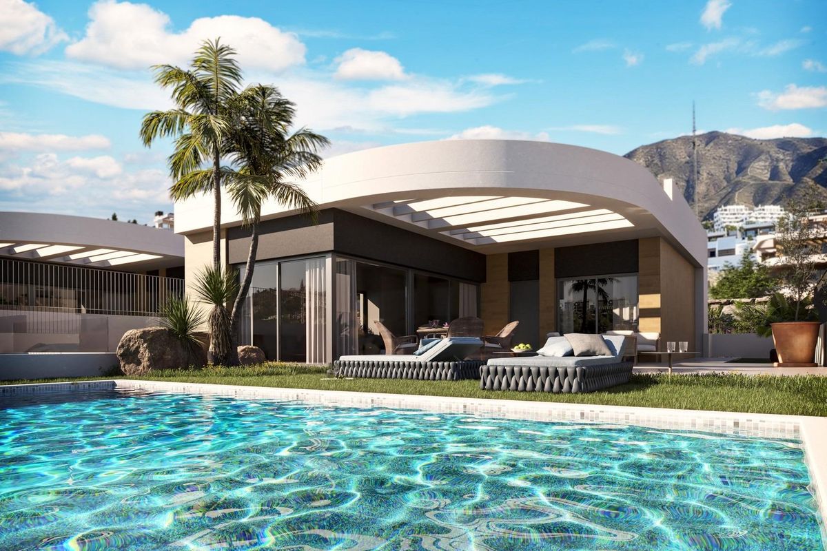 Buitenzicht op een moderne villa met 3 slaapkamers in Finestrat met een zwembad en fraaie beplanting.