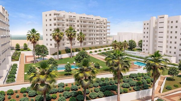 Buitenaanzicht van het appartementencomplex met zwembaden en tuinen in San Miguel de Salinas, Costa Blanca Zuid.