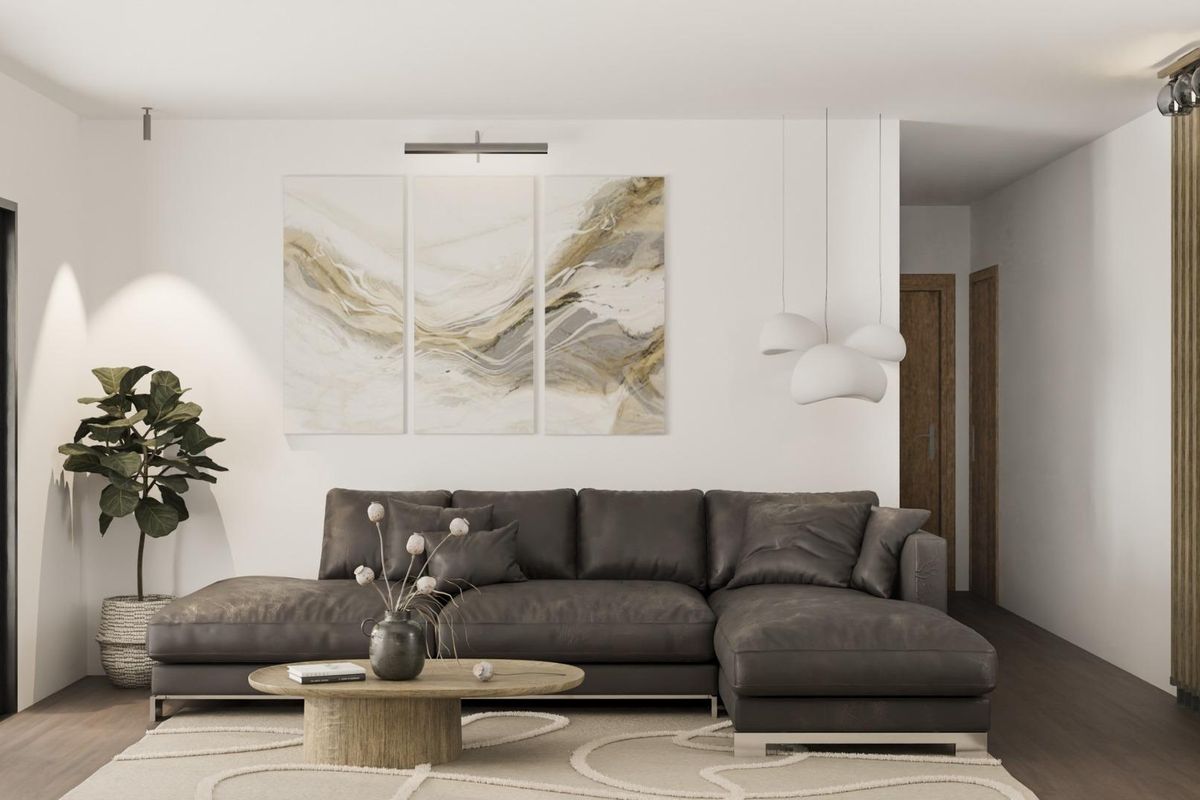 Modern living room with a large sectional sofa and artwork, in a 3-bed villa located in Pinoso, Costa Blanca.
