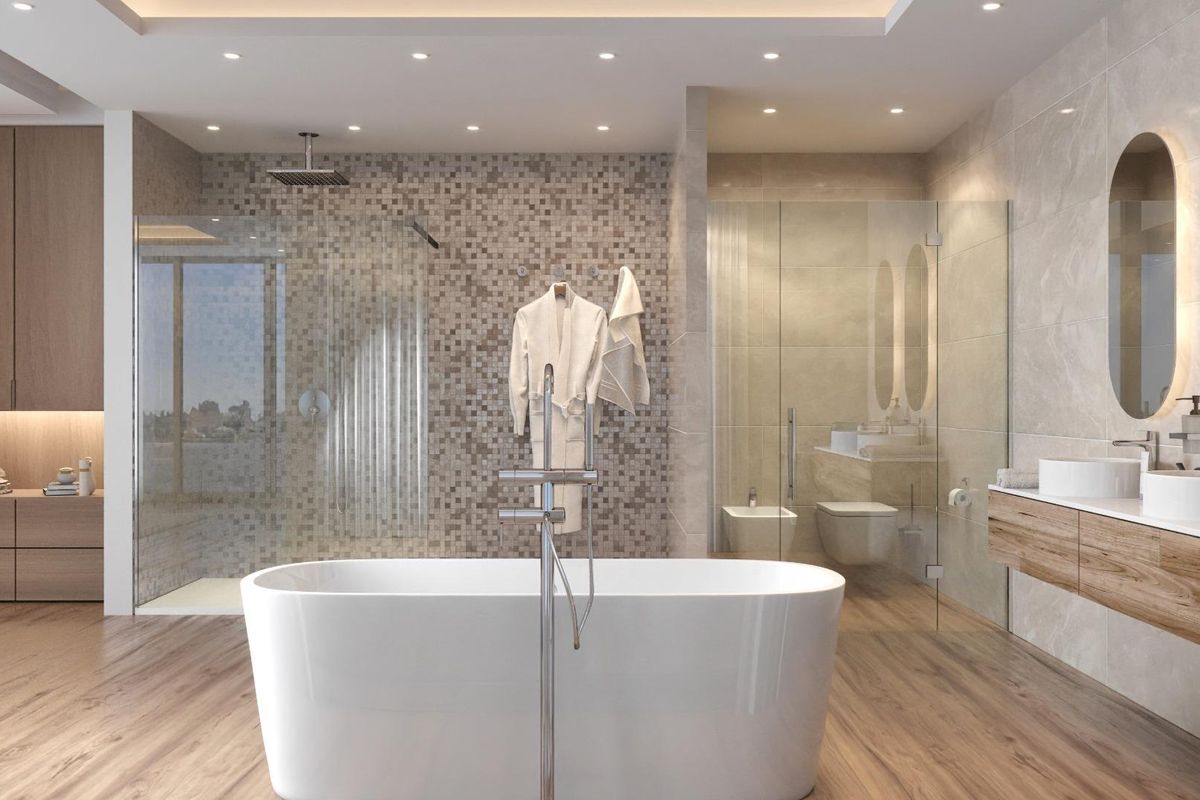 Luxueuze badkamer met een vrijstaand bad en moderne armaturen in een villa in Benahavís.