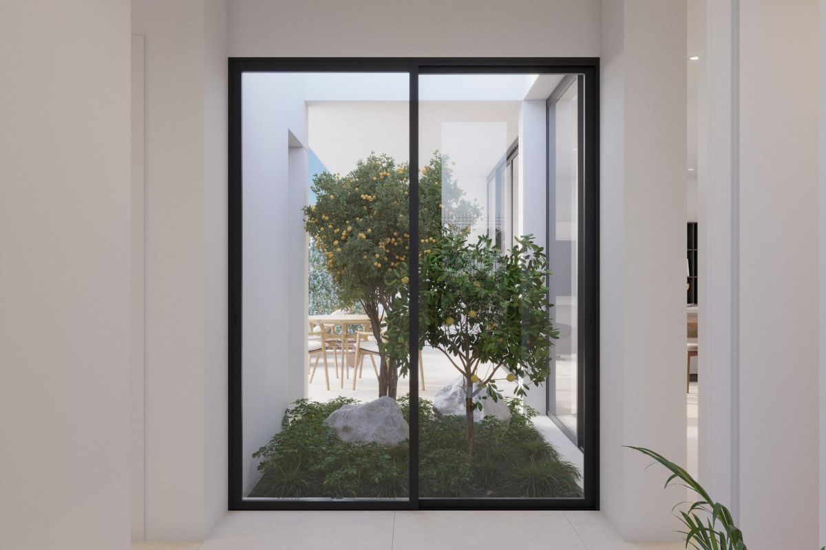 Open gang met uitzicht op een privétuin, met groen in de villa in Fuente Álamo.