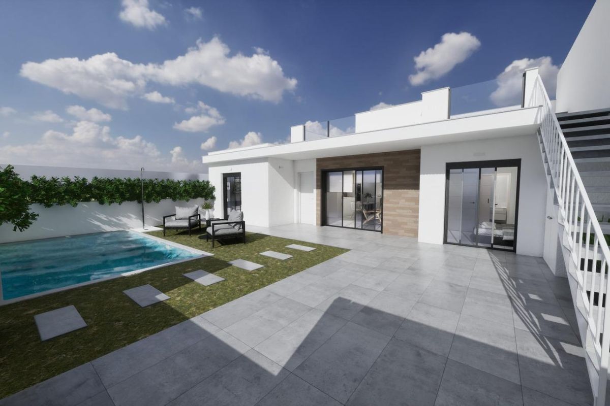 Zwembad en terras in villa Torre Pacheco