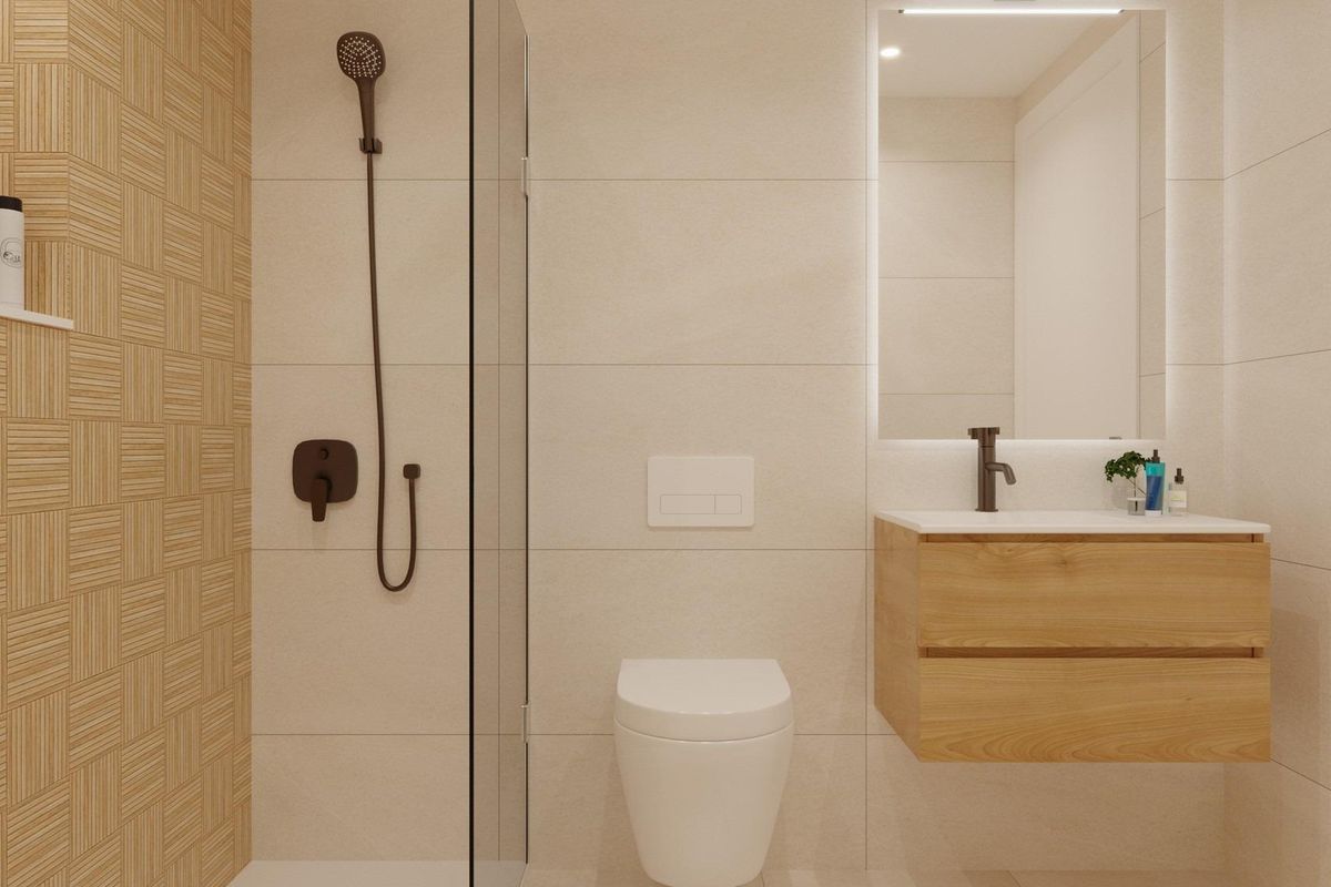 Chique badkamer met natuurlijke elementen en een glazen douche in een 3-slaapkamer appartement op de begane grond in San Pedro del Pinatar.