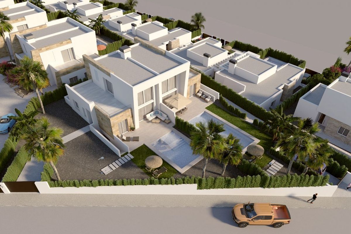 Luchtfoto van een resortstijlcomplex met palmbomen in Algorfa, met 3-slaapkamer townhouses.