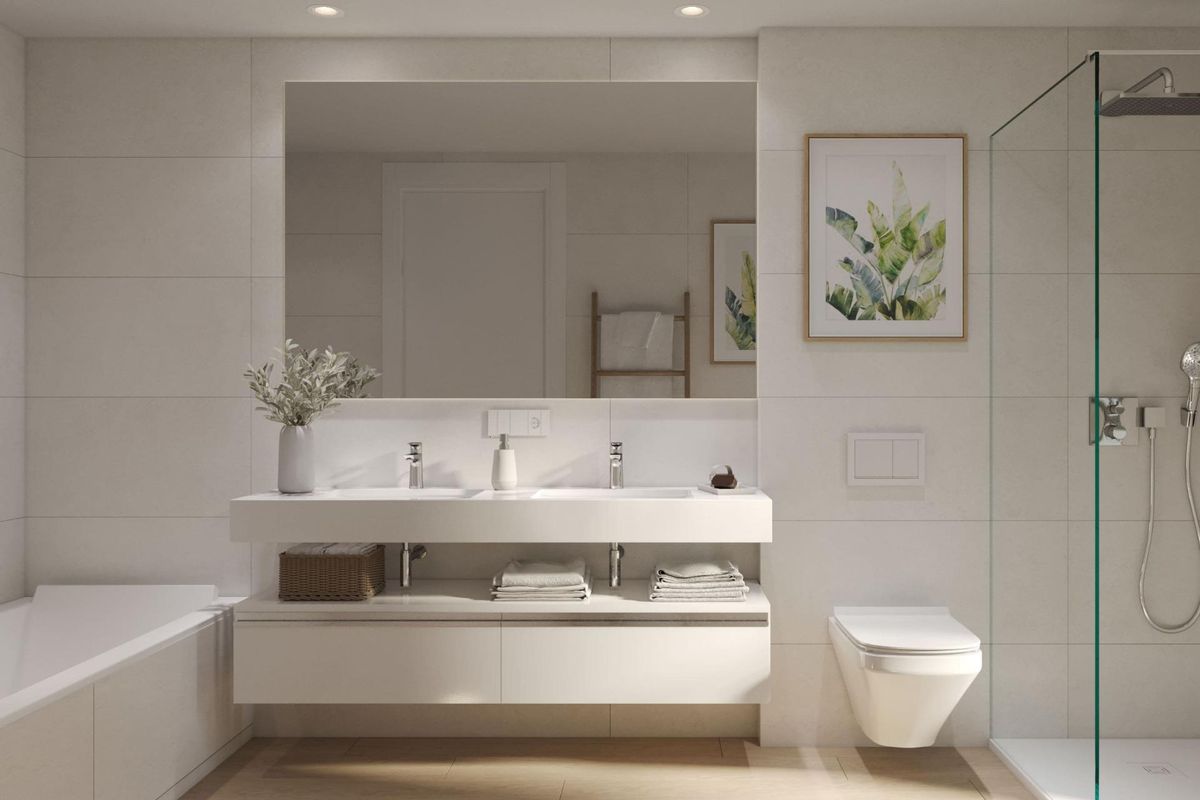 Moderne badkamer met dubbele wastafel en glazen douche in een 3-slaapkamer appartement in Estepona, Costa del Sol.