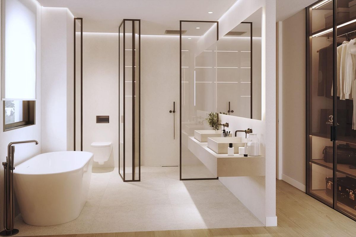 Luxueuze badkamer met een vrijstaand bad in een appartement in Málaga, met een combinatie van comfort en moderne stijl.