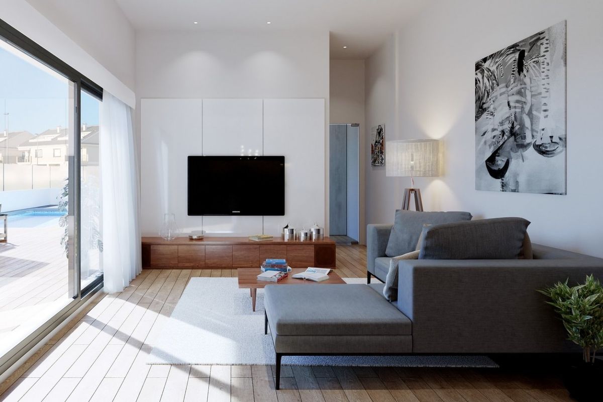 Stijlvolle woonkamer in een townhouse in San Javier met een groot raam en uitzicht op het zwembad, comfortabel ingericht.