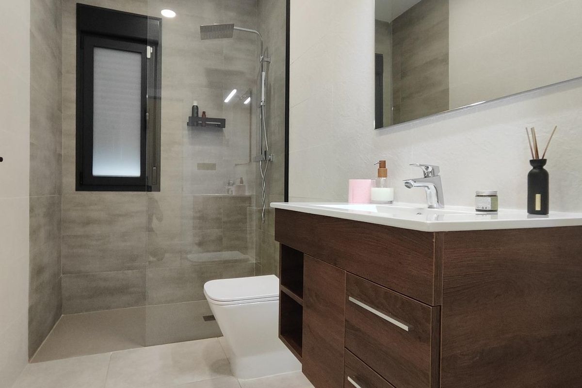 Stylish bathroom featuring a walk-in shower and modern fixtures in a villa in Pinoso, Costa Blanca South.