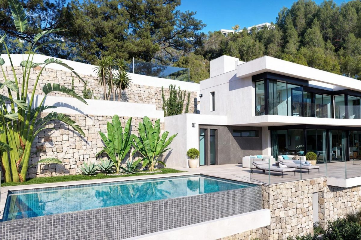 Moderne 4-slaapkamer villa in Benissa, Costa Blanca met een prachtig terras en zwembad omgeven door weelderig groen.