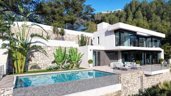 Moderne 4-slaapkamer villa in Benissa, Costa Blanca met een prachtig terras en zwembad omgeven door weelderig groen.