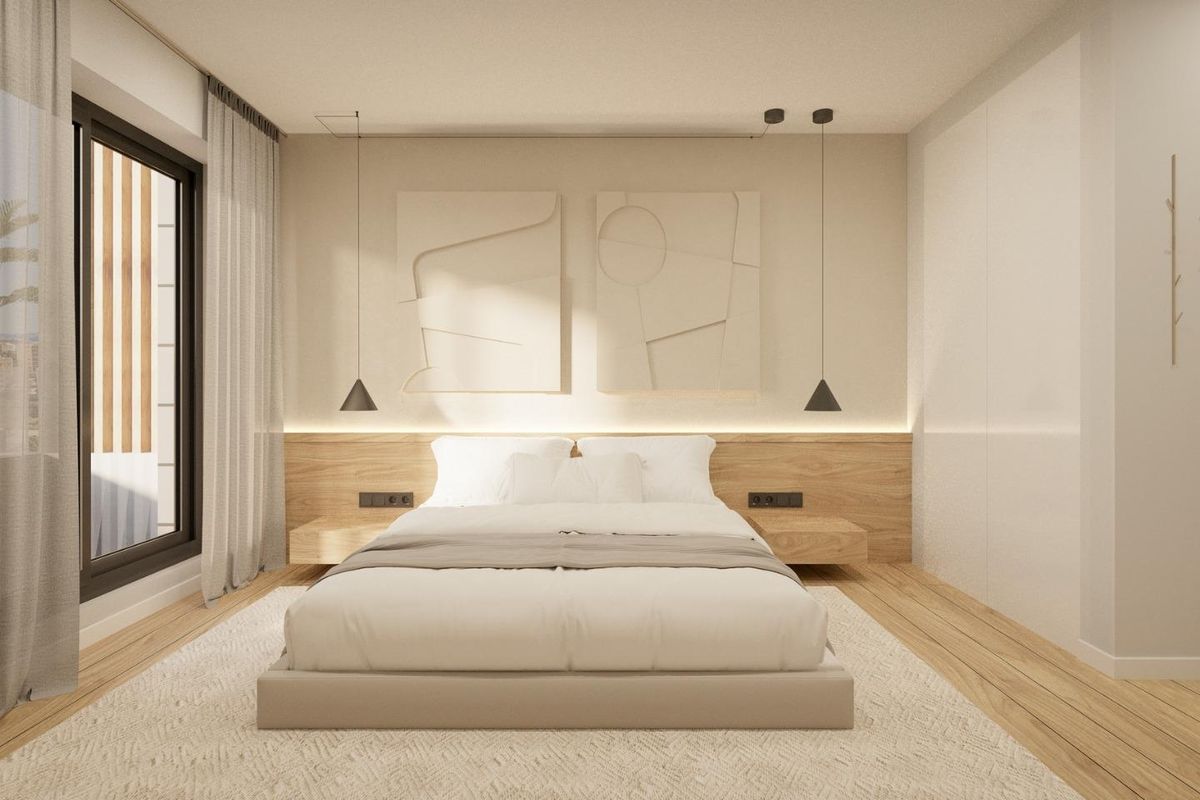 Moderne slaapkamer in een penthouse met 3 slaapkamers in Estepona, met een minimalistisch ontwerp en zachte verlichting.