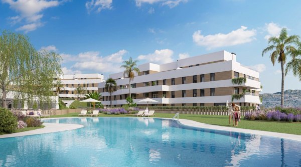 Buitenzicht op een modern appartementencomplex met zwembad in Mijas, Costa del Sol.