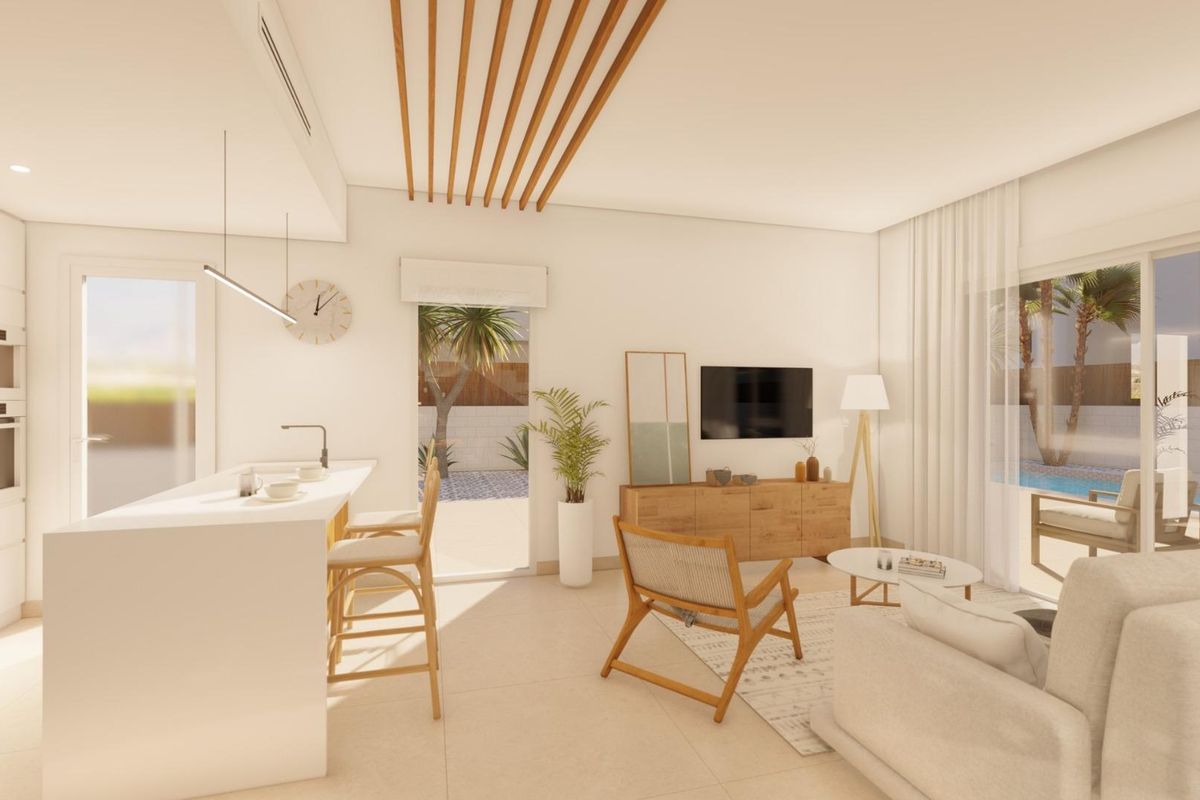 Moderne keuken in de 3-slaapkamer villa in Pilar de La Horadada, met zitplaatsen bij het eiland en heldere decoratie.