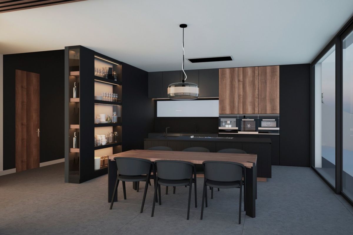 Moderne keuken met strakke kasten en eettafel in villa in Altea, Costa Blanca Noord.