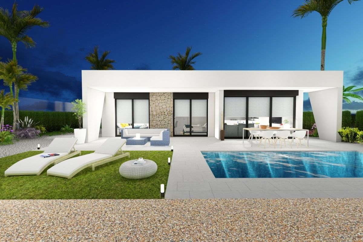 Evening view of a 2-bed villa in Calasparra, highlighting the pool and outdoor lounge.