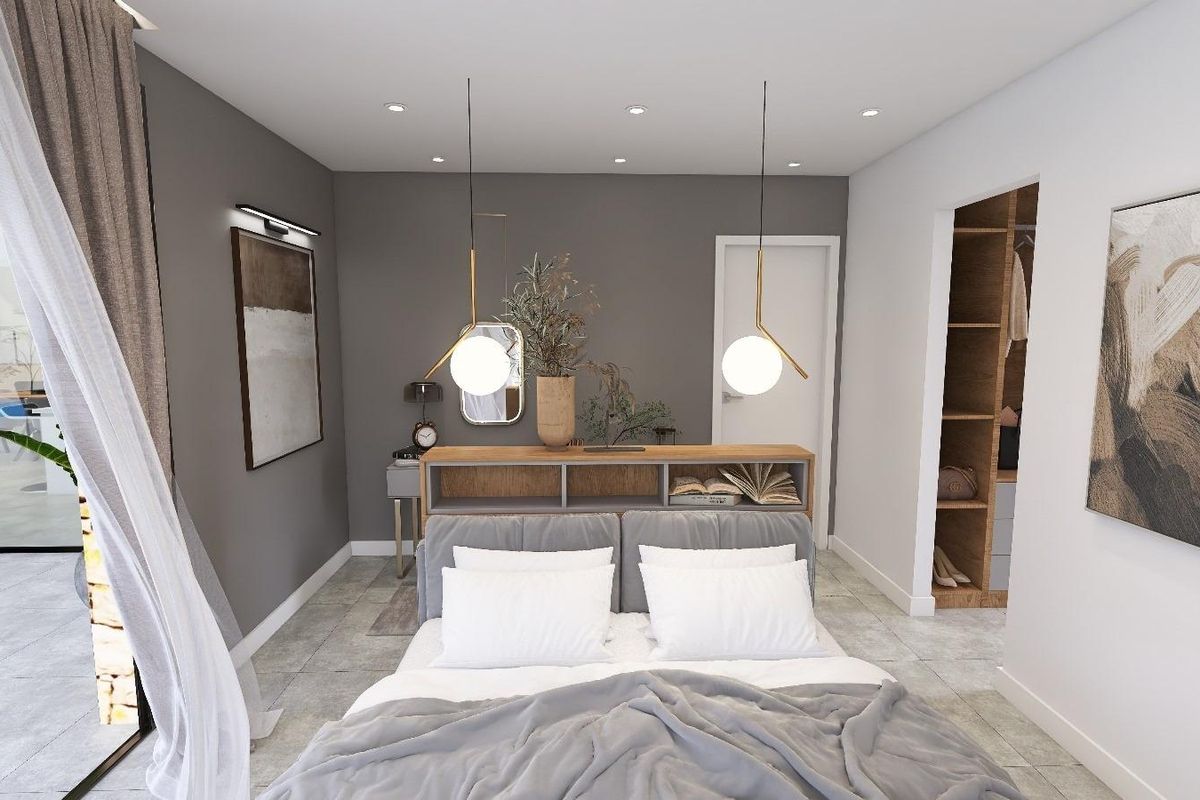 Gezellige slaapkamer met stijlvolle inrichting en natuurlijk licht in een villa in Aspe, Costa Blanca Zuid, Spanje.