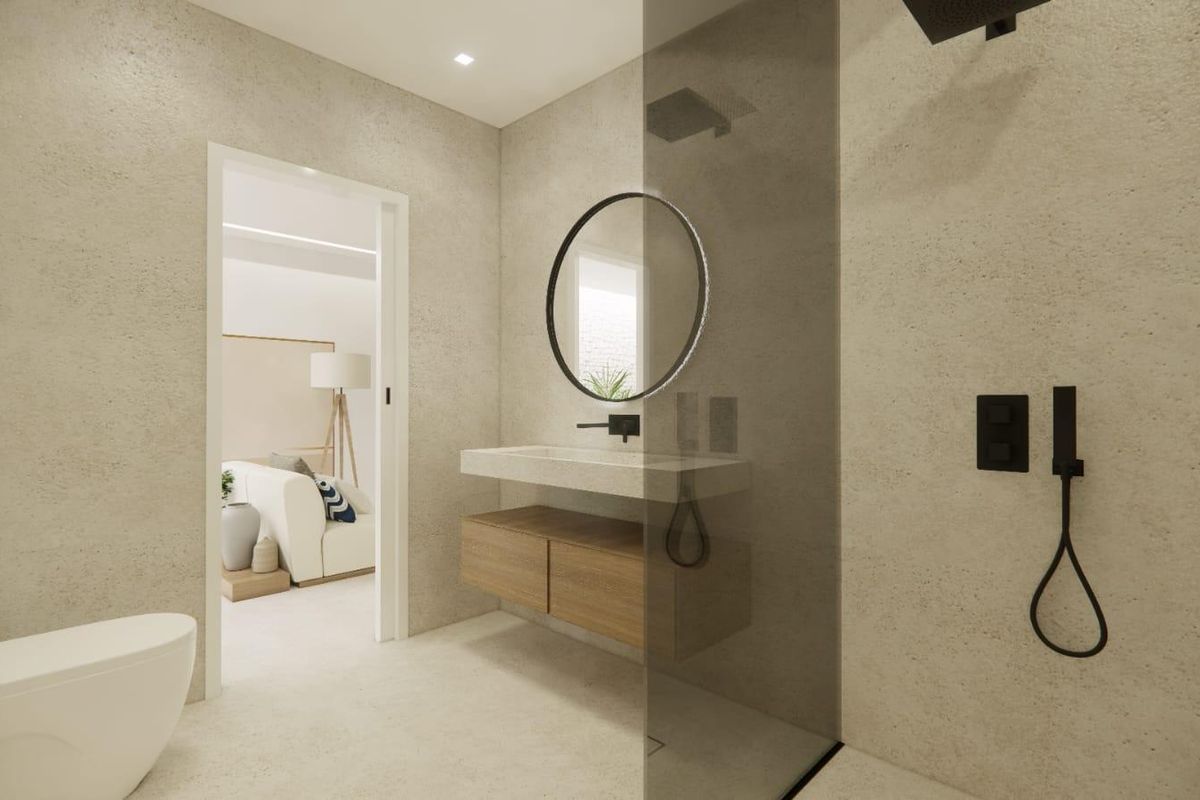 Moderne badkamer met douche, wastafel en spiegel in een 1-slaapkamer appartement in Catral, Costa Blanca, Spanje.