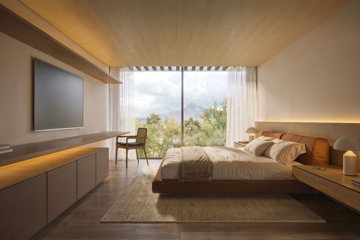 Gezellige master bedroom met schilderachtige uitzichten in de moderne 4-slaapkamer villa in Marbella.