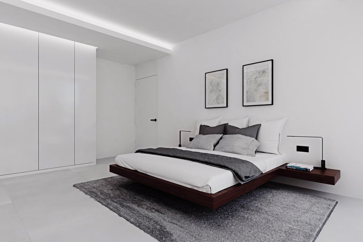 Minimalistische gasten slaapkamer in een penthouse met 4 slaapkamers, met een modern bed en voldoende opbergruimte in Calpe.