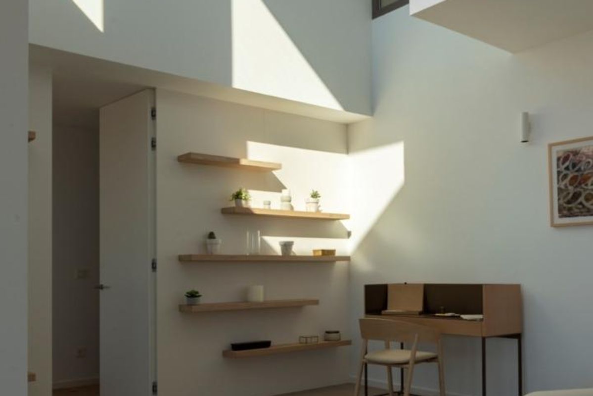 Bright entryway of a 4-bed villa in Benitachell, showcasing modern design and natural light.