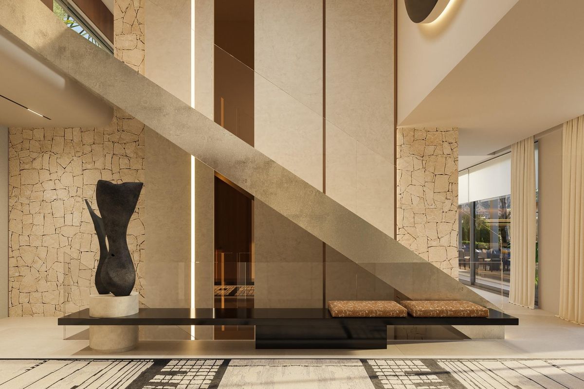 Contemporary entreehal met artistieke decoratie en modern ontwerp in een villa in Marbella.