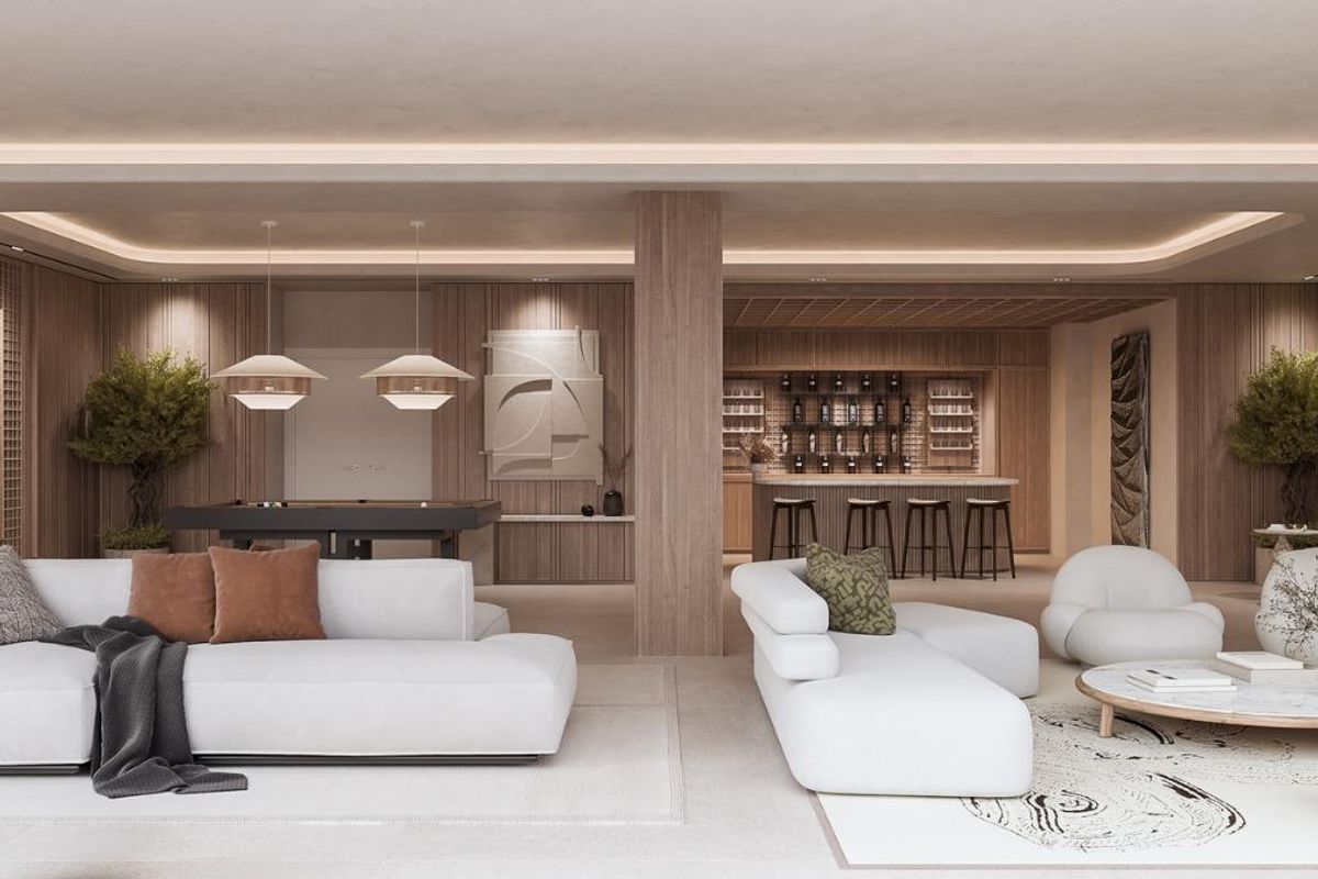 Elegante woonkamer en bar in een 5-slaapkamer villa in Marbella, met hedendaagse meubels en verlichting.