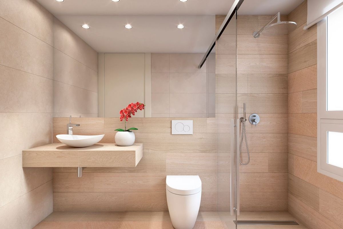 Elegante badkamer met moderne armaturen en een inloopdouche in het appartement op de begane grond in Algorfa.