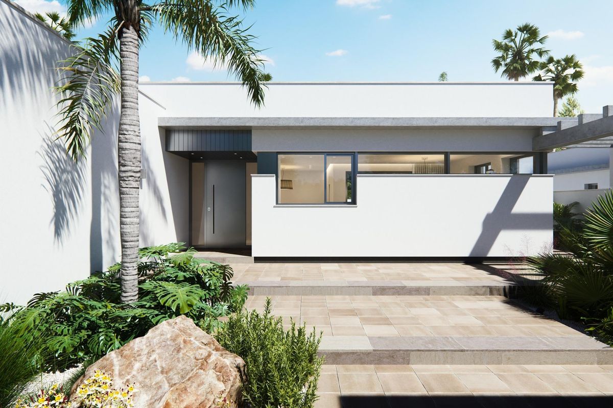 Moderne witte villa in San Javier met strakke architectuur en groene tropische entree