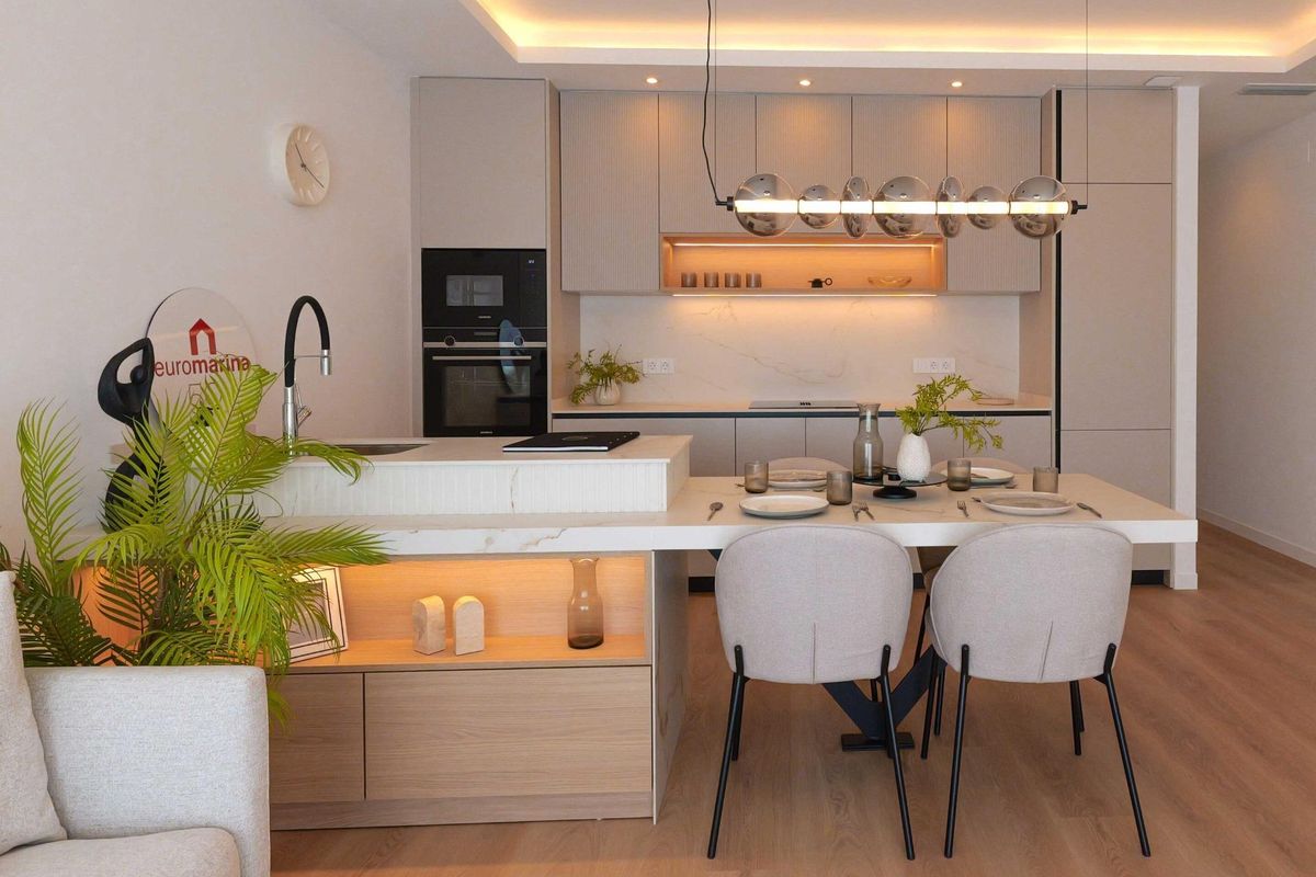 Contemporary kitchen and dining area with minimalistic decor, La Manga del Mar Menor, Spain.