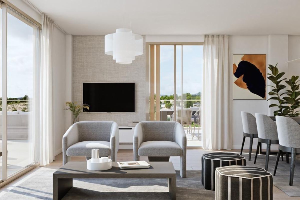 Interior view of the living space in the 3-bed apartment in Godella, featuring modern furnishings and a terrace.