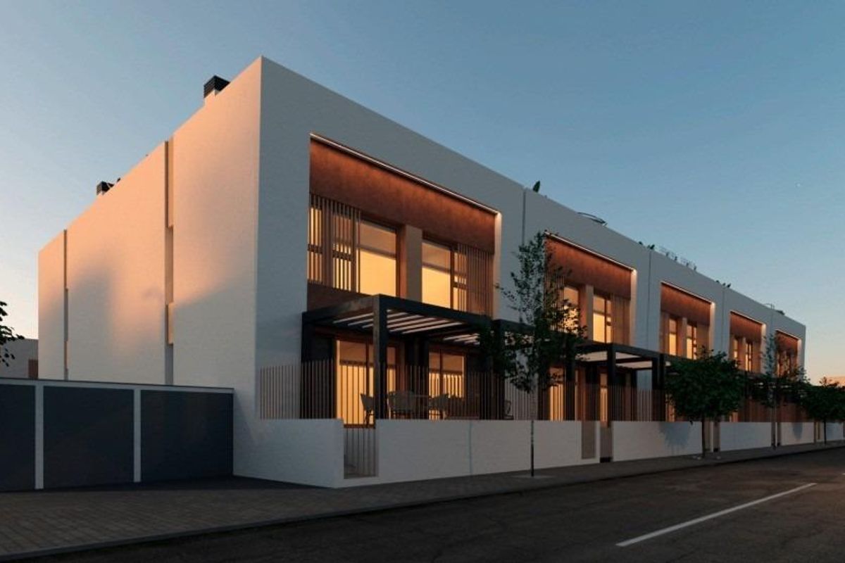 Exterior view of a 3-bed townhouse in Dolores, Costa Blanca South, showing modern architecture, private patios, and street frontage.