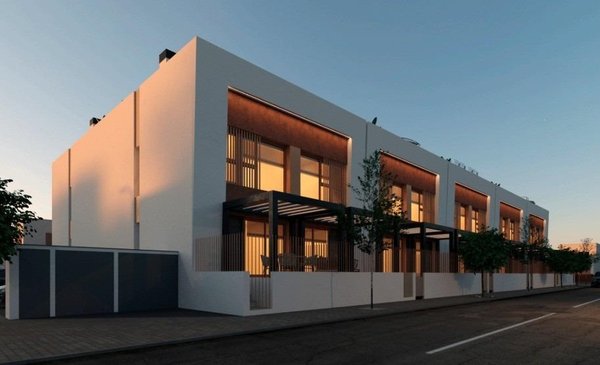Exterior view of a 3-bed townhouse in Dolores, Costa Blanca South, showing modern architecture, private patios, and street frontage.