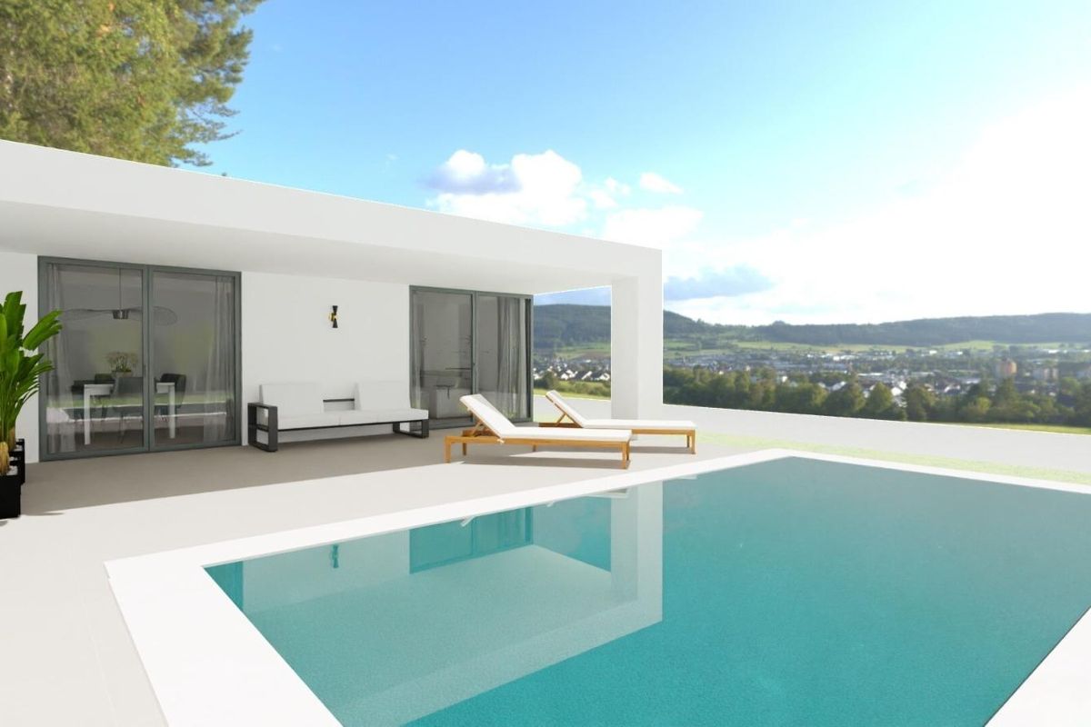 Stunning pool area with loungers and beautiful views in a 3-bed villa located in Monforte del Cid, Costa Blanca South.