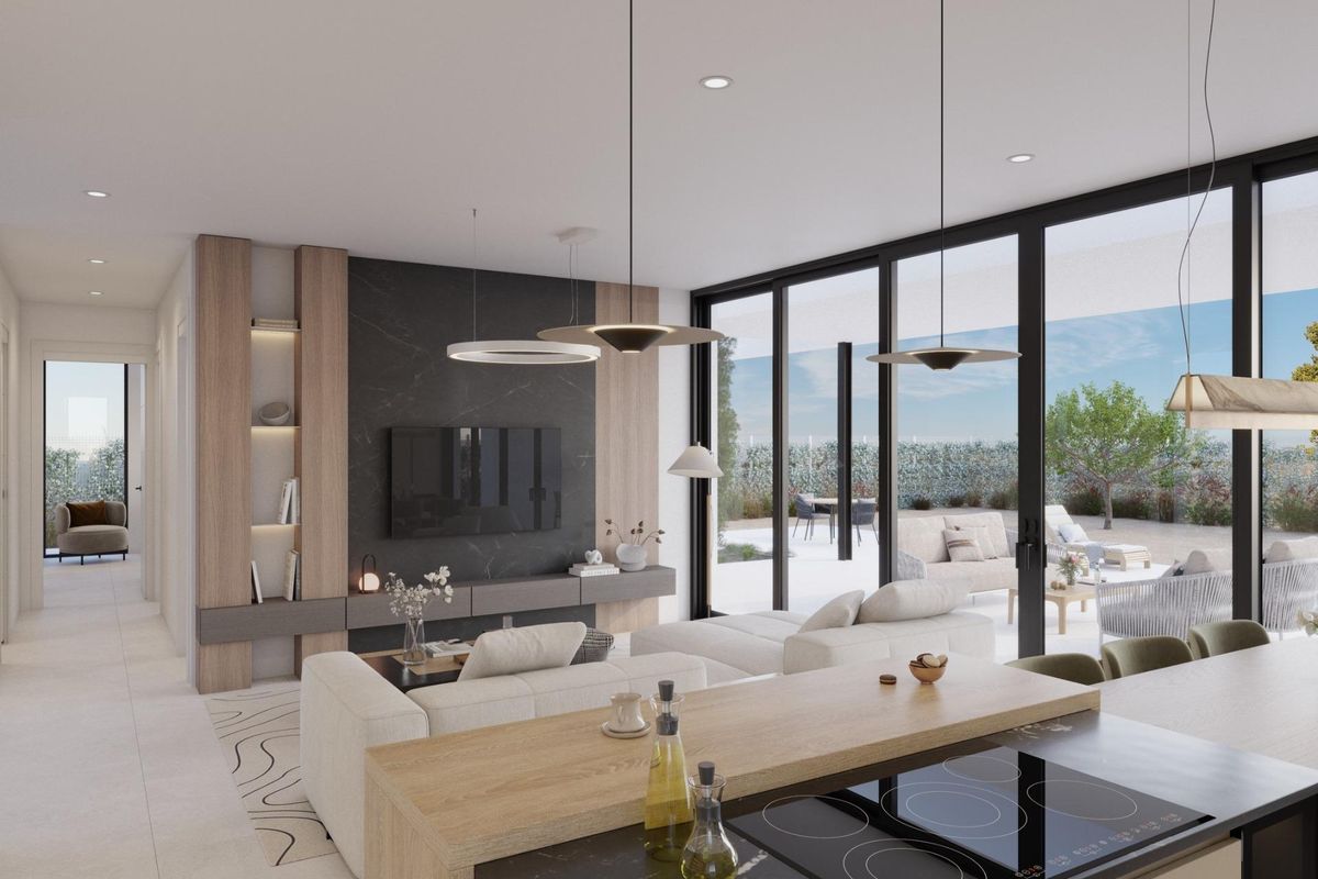 Heldere woonkamer en keuken van een 3-slaapkamer villa in Fuente Álamo, Costa Calida, met grote ramen en een gezellige inrichting.