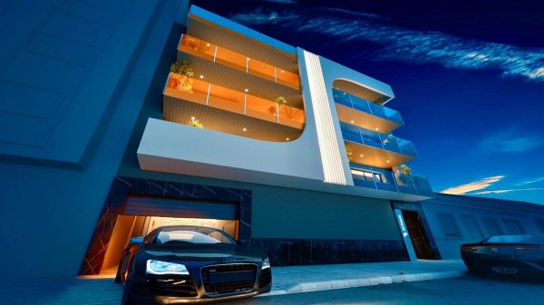 Moderne buitenkant van een 3-slaapkamer penthouse in Torrevieja, met unieke architecturale ontwerpen bij nacht.