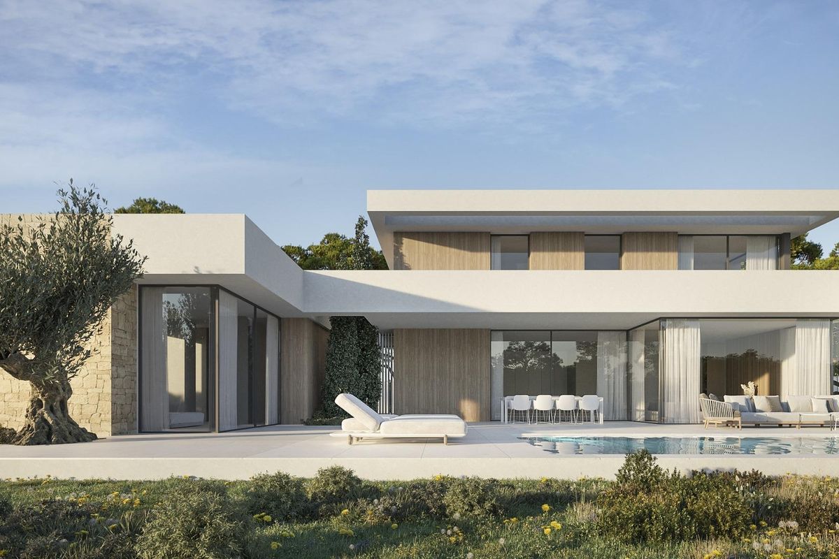 Vooraanzicht van de luxe villa in Moraira Teulada, met nadruk op het zwembad en buitenruimtes.