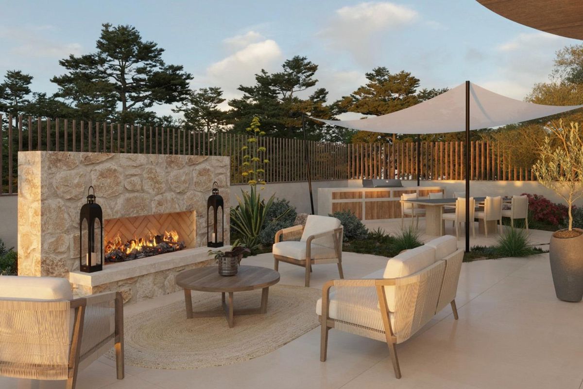 Gezellig buitenzitje met een open haard bij de villa in San Fulgencio, perfect voor ontspanning.