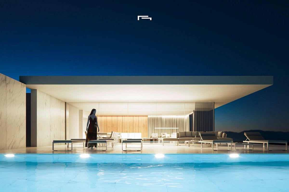 Zijaanzicht van een luxe villa in Moraira, Costa Blanca, met elegante zitplaatsen en een prachtig uitzicht.